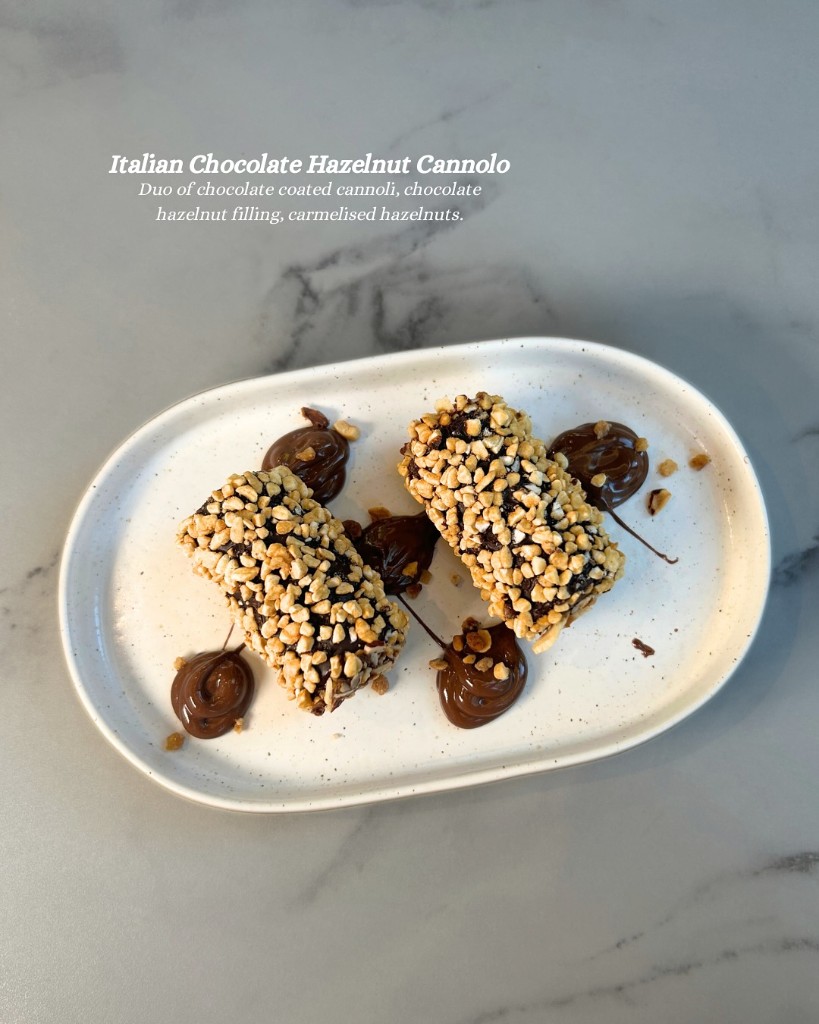 Chocolate hazelnut cannoli on marble